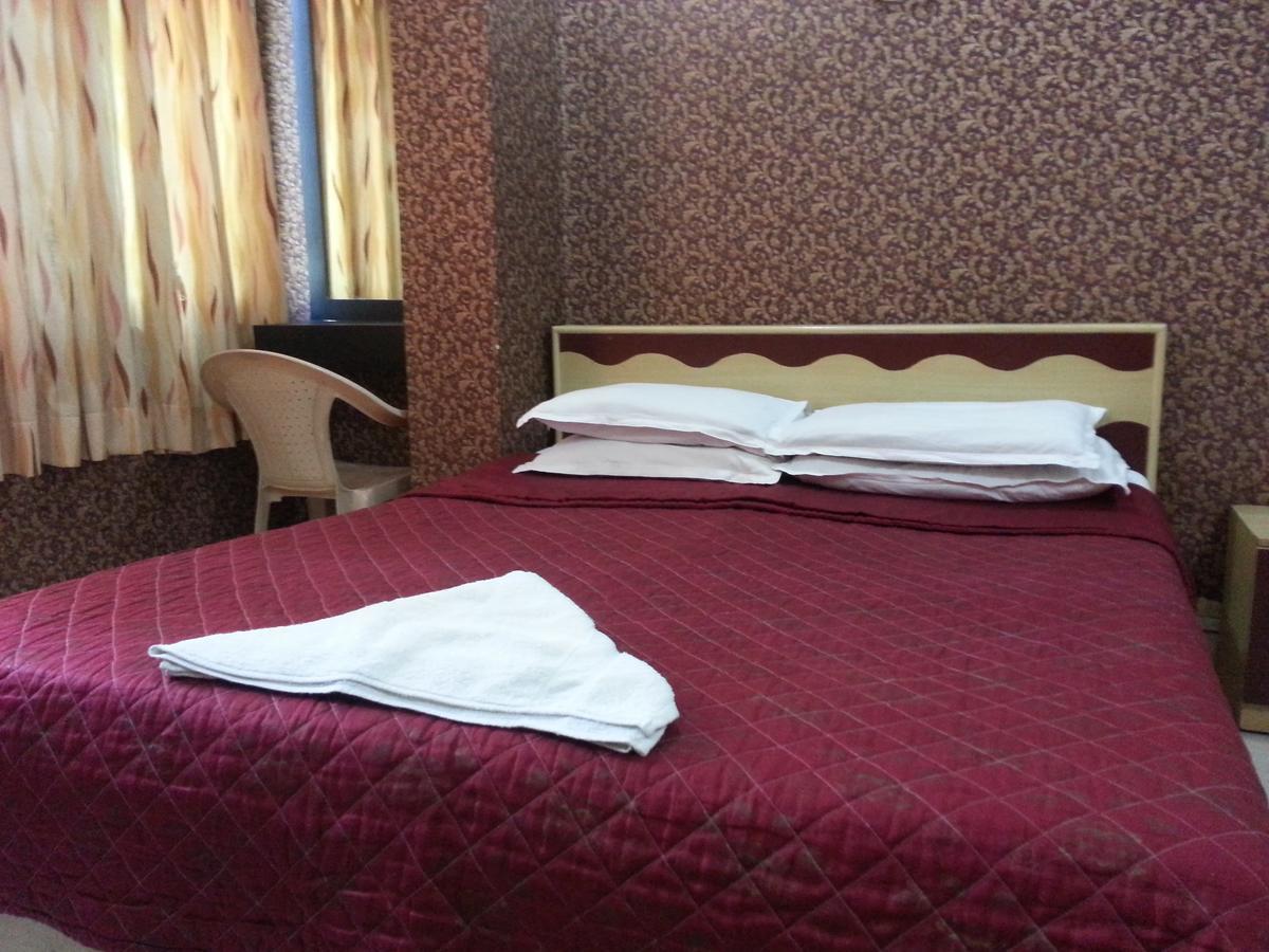 Hotel Sea Sands Bombaim Quarto foto